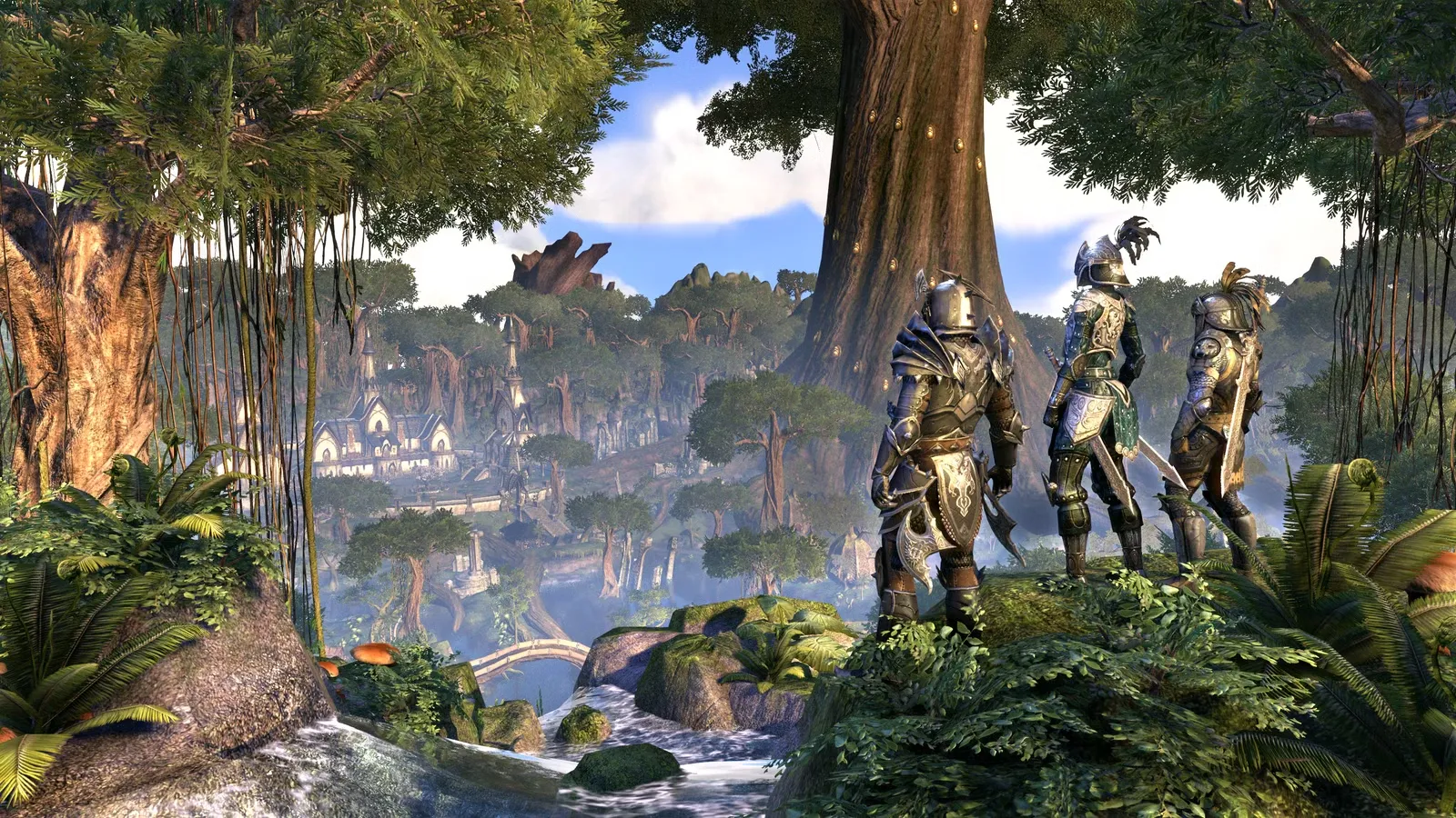 Três personagens de armadura pesada observam uma cidade élfica em meio à floresta, cena de The Elder Scrolls Online, MMO da ZeniMax Online