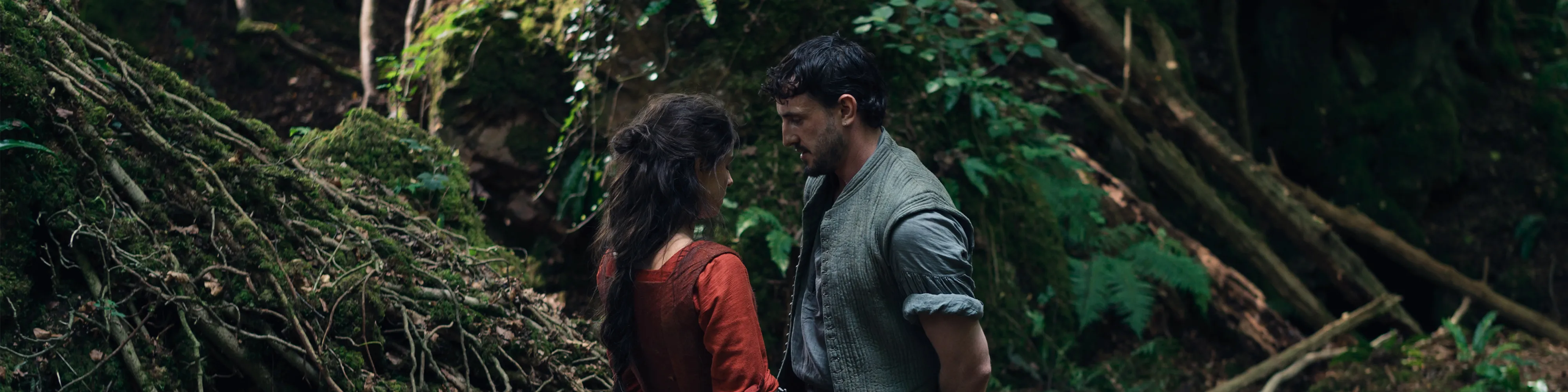 Banner promocional de Hamnet com elenco em cenário elisabetano