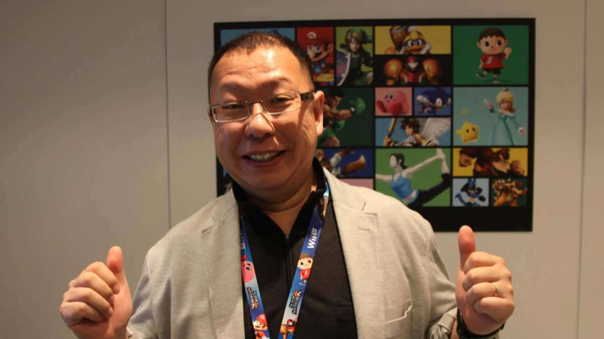 Takashi Tezuka sorrindo em um evento da Nintendo